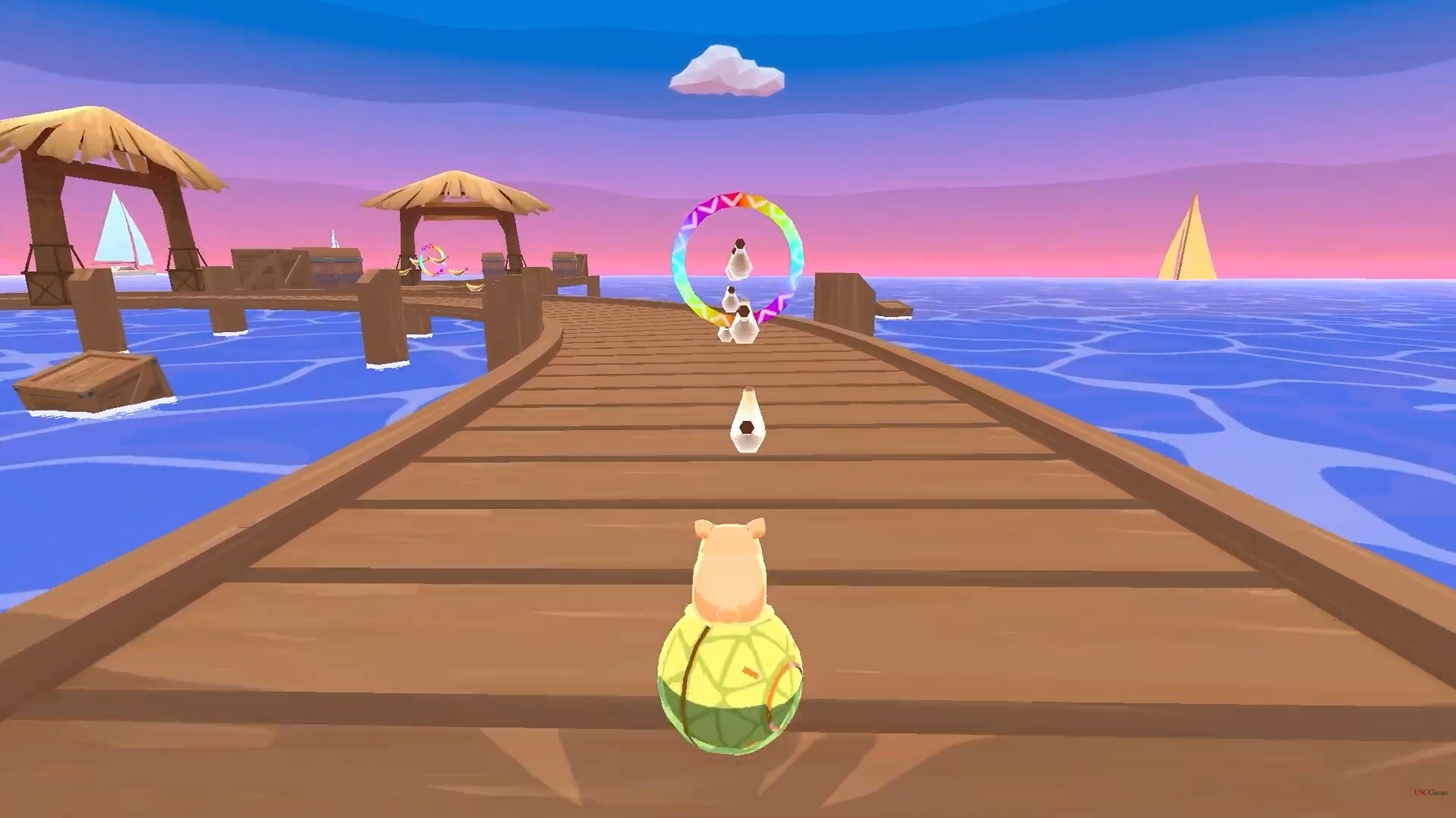 Move Move Melon! level 1.1: Melon rolling along a wooden pier at sunset toward a rainbow ring